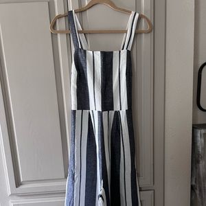 strived jumpsuit with open back cropped length